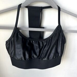 Noli liquid Black sports bra. New with Tags